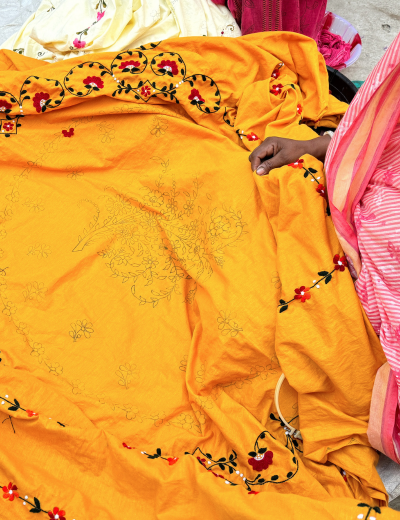 Handcrafted handloom fabric featuring tribal art and Indian folk motifs, transforming traditional art into wearable textile | Banbithi Boutique